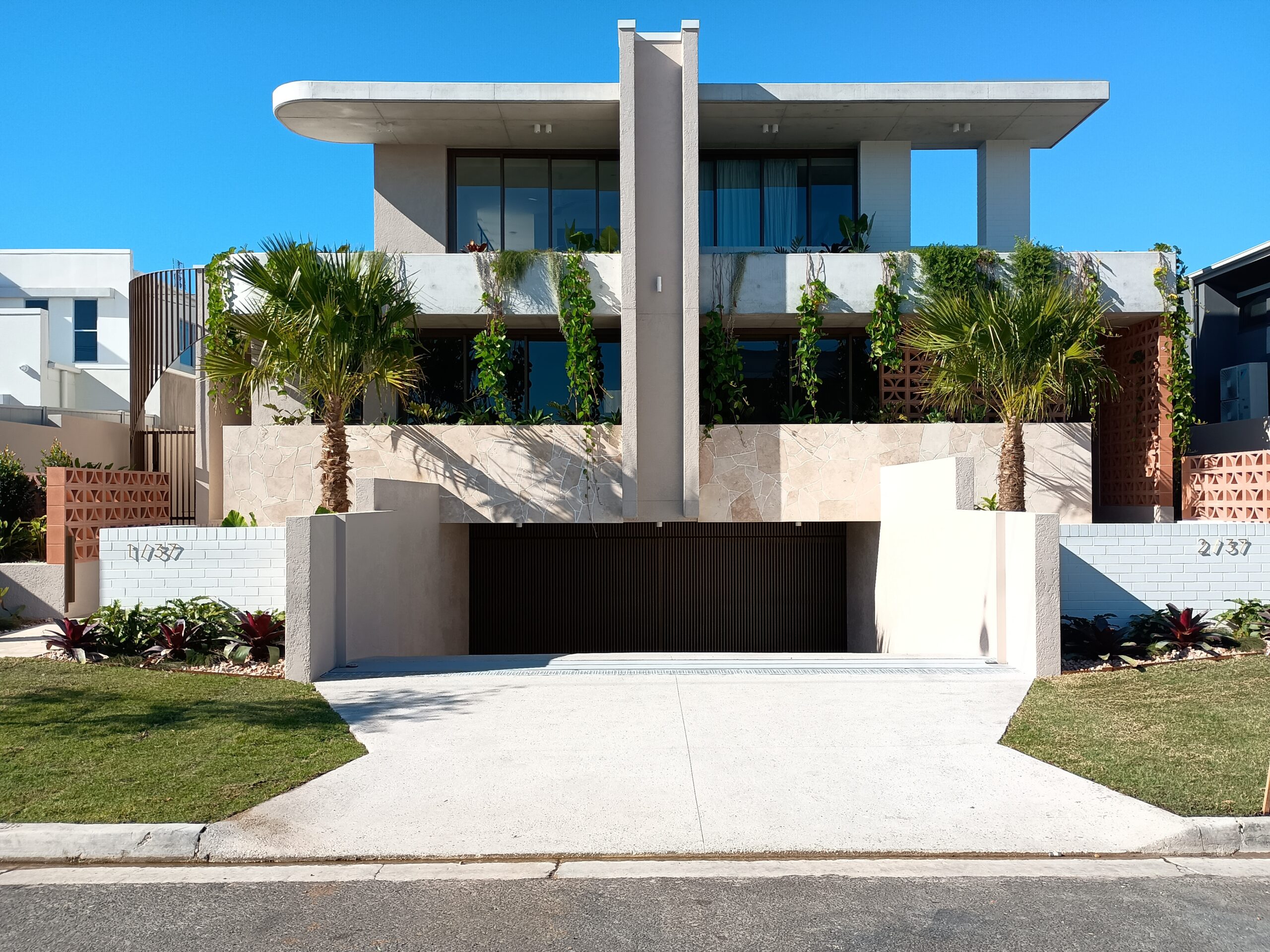 automatic flood barrier system installed to prevent water entering residential building in Mooloolaba