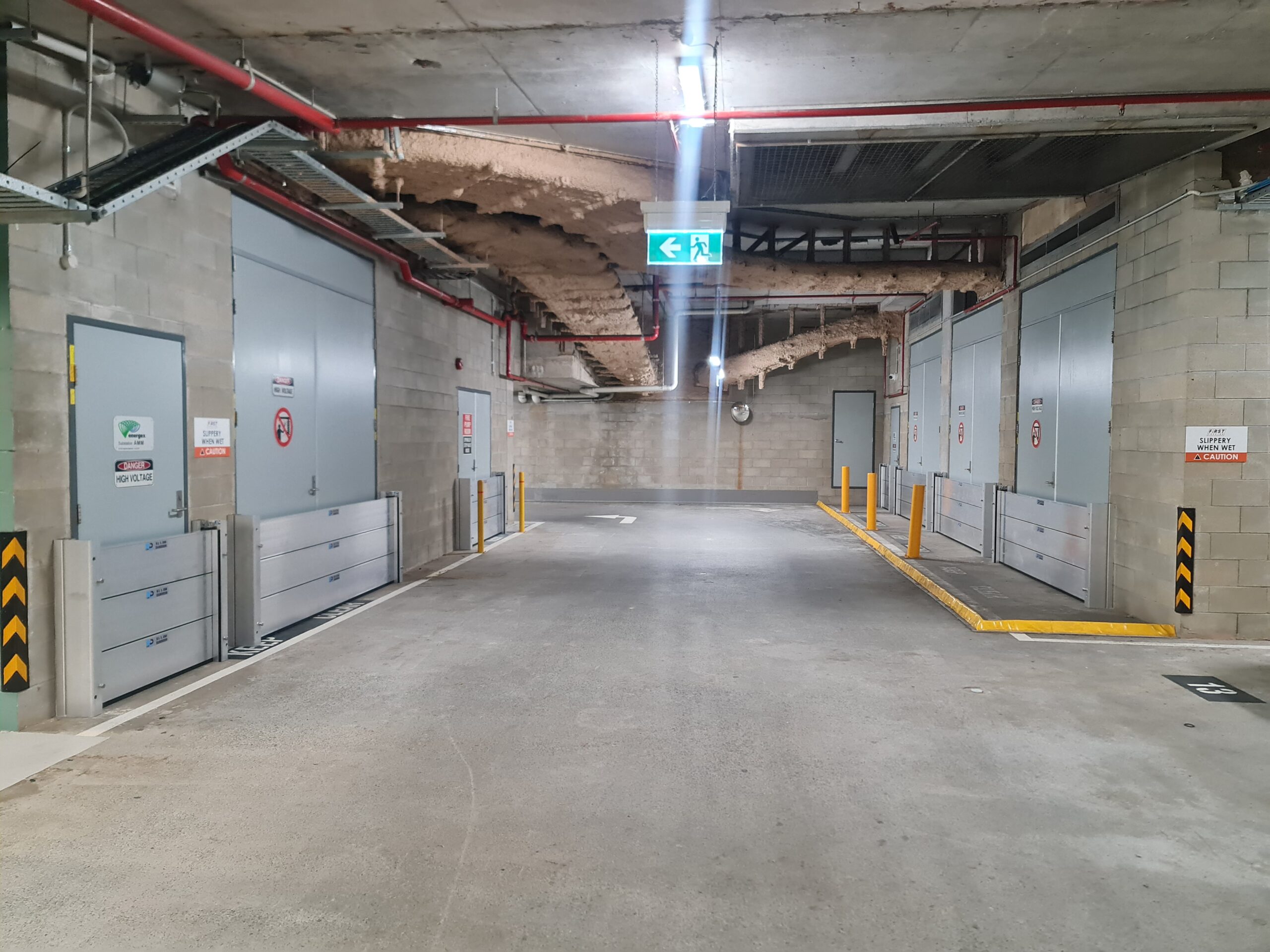 demountable flood barriers installed in commercial building in Brisbane QLD to protect basement infrastructure from floodwater