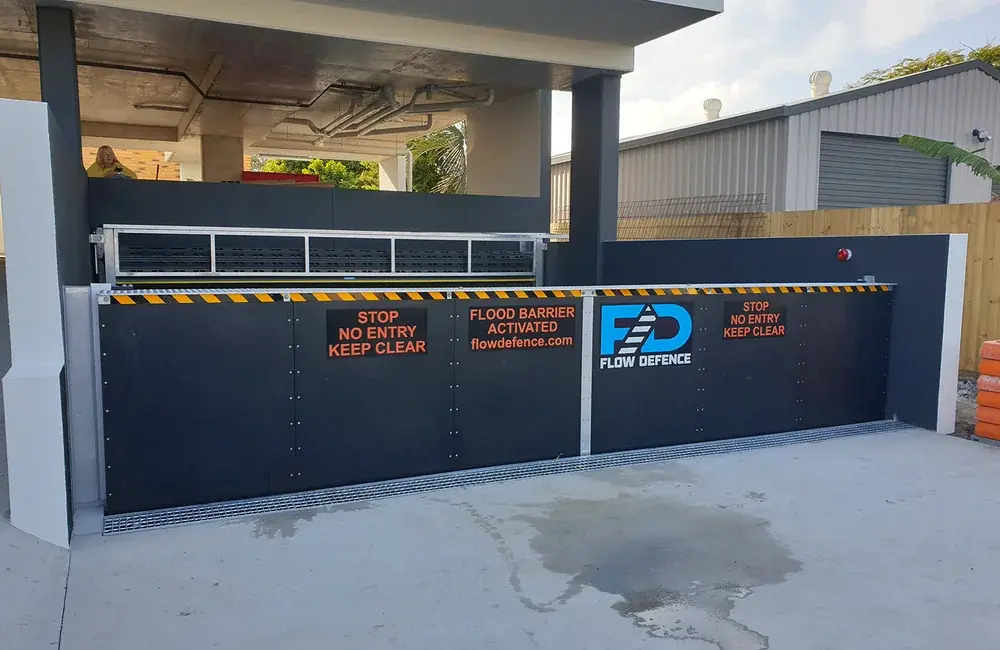 Flow Defence self-activating flood barrier installed at a basement car park entry